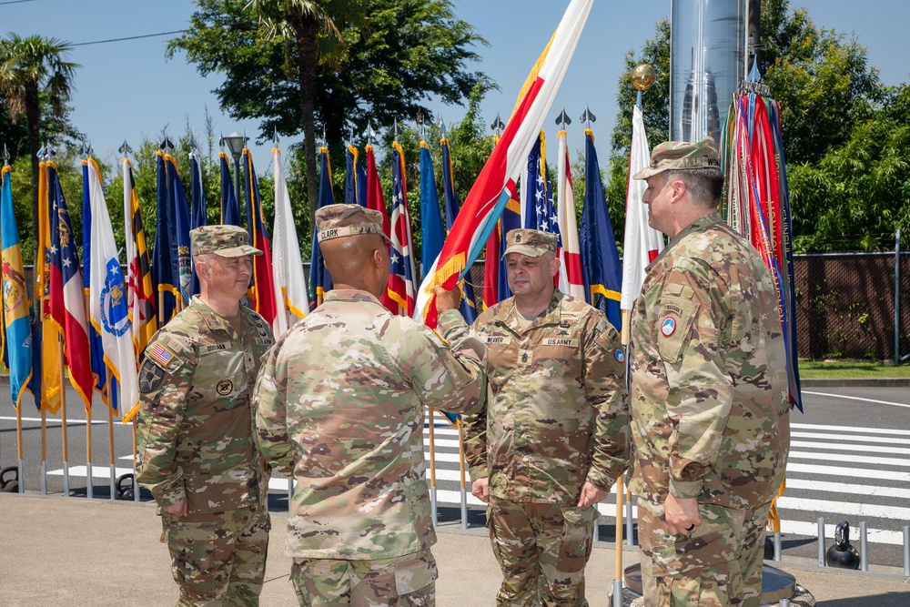 Maj. Gen. Dave Womack relinquishes command of U.S. Army Japan to Brig. Gen. James Dooghan, as Gen