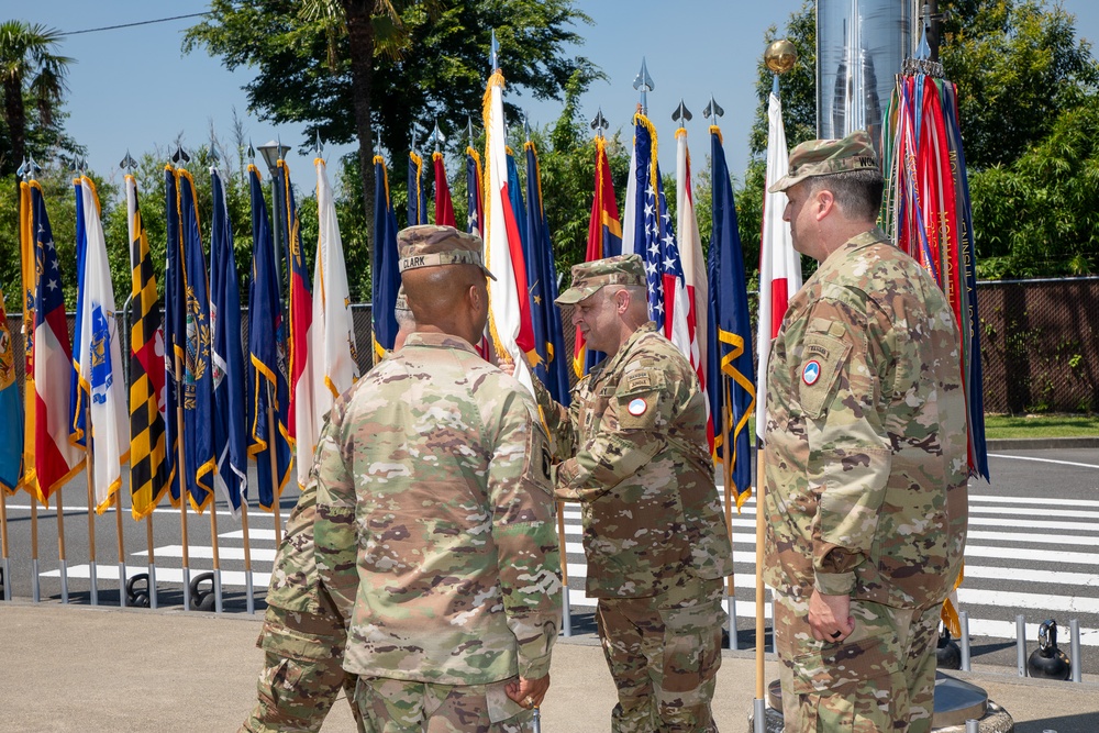 Maj. Gen. Dave Womack relinquishes command of U.S. Army Japan to Brig. Gen. James Dooghan, as Gen