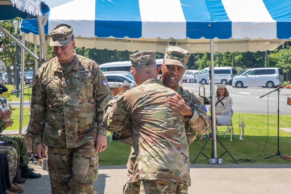 Maj. Gen. Dave Womack relinquishes command of U.S. Army Japan to Brig. Gen. James Dooghan, as Gen