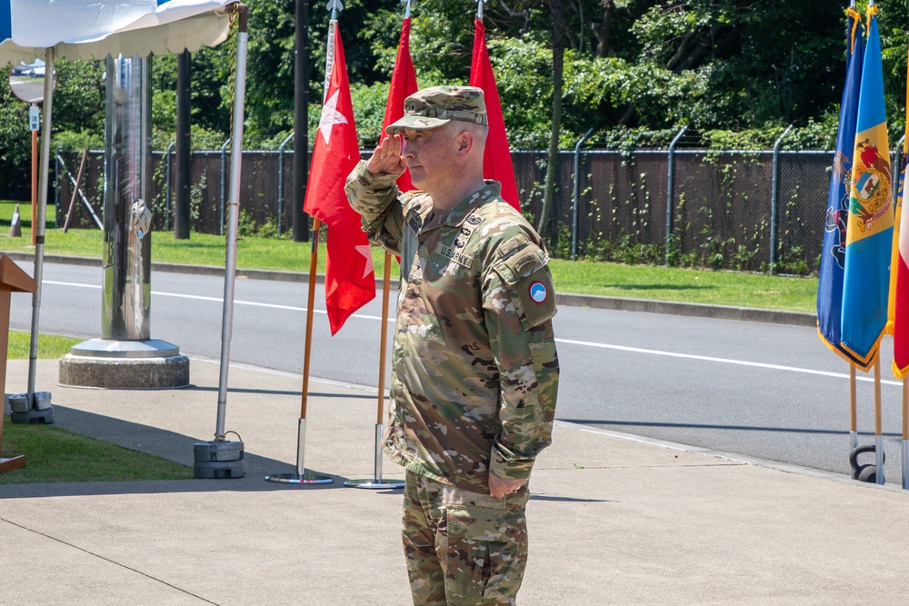 Maj. Gen. Dave Womack relinquishes command of U.S. Army Japan to Brig. Gen. James Dooghan, as Gen
