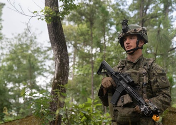 Kosovo soldier pulls security at JRTC