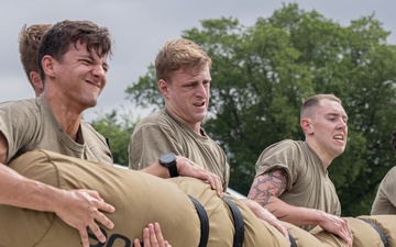 U.S. Army soldiers with the 11th Cyber Battalion, 780th Military Intelligence Brigade, Army Cyber Command, participate in a fitness competition during the Army's 250th Birthday Festival