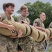 U.S. Army soldiers with the 11th Cyber Battalion, 780th Military Intelligence Brigade, Army Cyber Command, participate in a fitness competition during the Army's 250th Birthday Festival