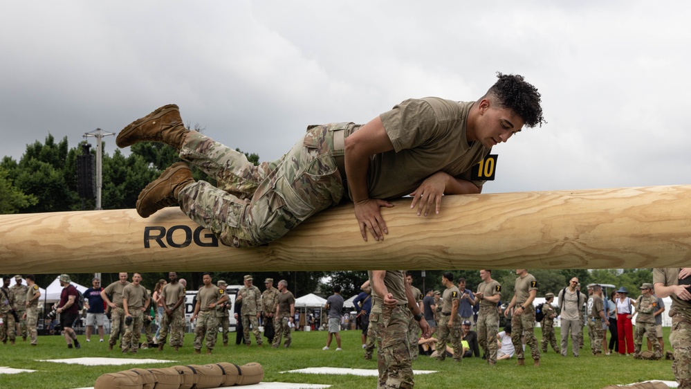 U.S. Army Spc. Dyhhon, Martin with the 11th Cyber Battalion, 780th Military Intelligence Brigade, Army Cyber Command, participate in a fitness competition during the Army's 250th Birthday Festival