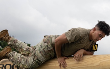 U.S. Army Spc. Dyhhon, Martin with the 11th Cyber Battalion, 780th Military Intelligence Brigade, Army Cyber Command, participate in a fitness competition during the Army's 250th Birthday Festival