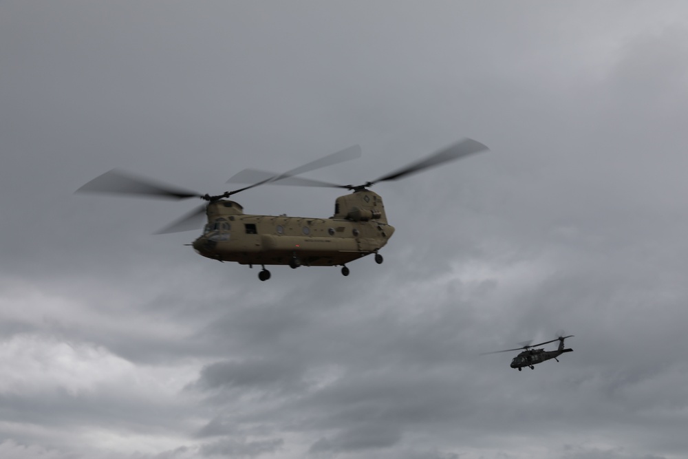 Army helicopters fly overhead at JRTC