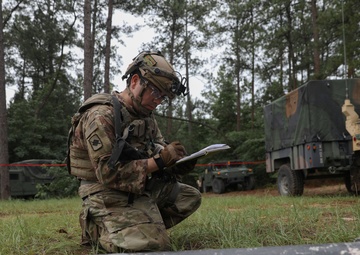 Soldier inspects a dropped missile at JRTC