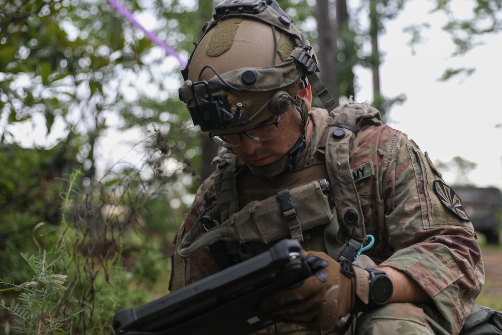 Soldier inspects dropped missile at JRTC