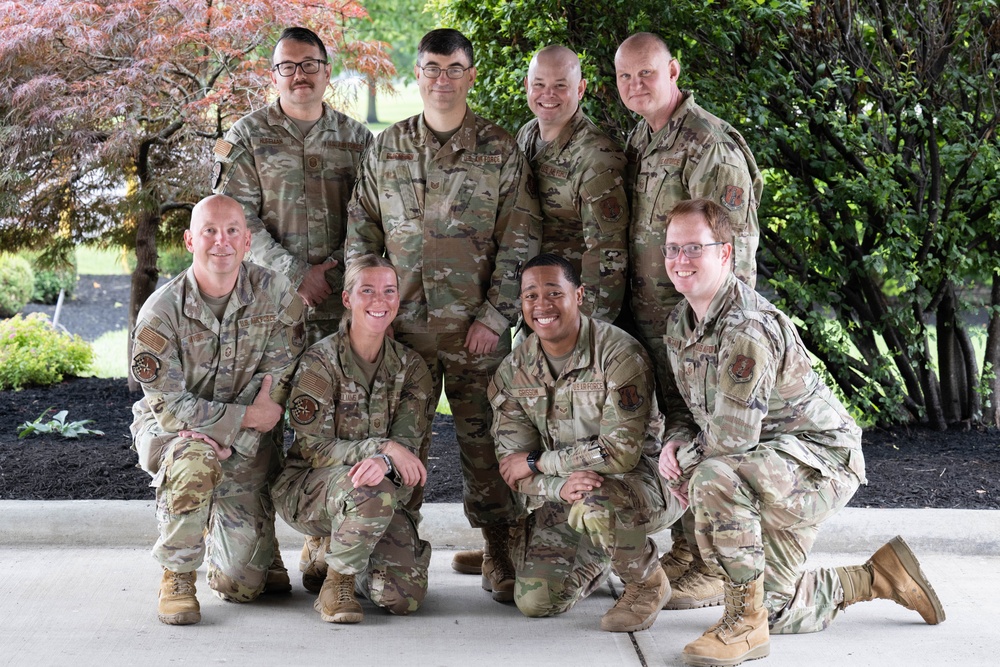 181st Communication Squadron pose for a group photo at Wright-Patterson Air Force Base