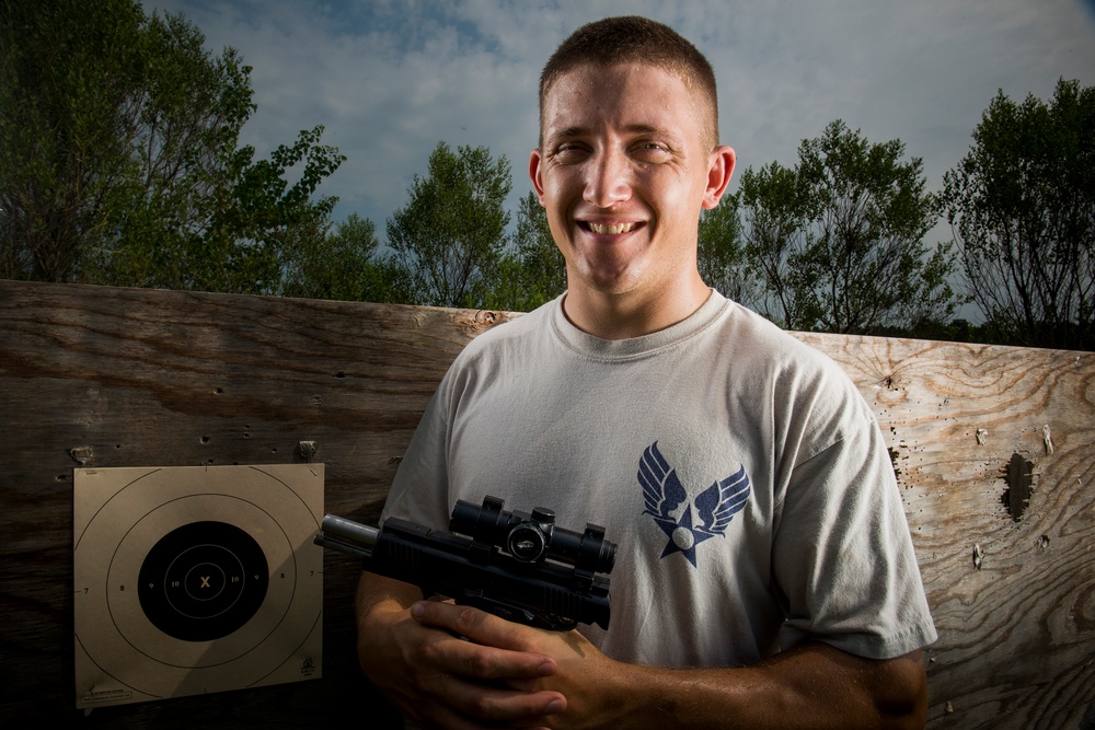 A gun and a smile