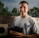 A gun and a smile