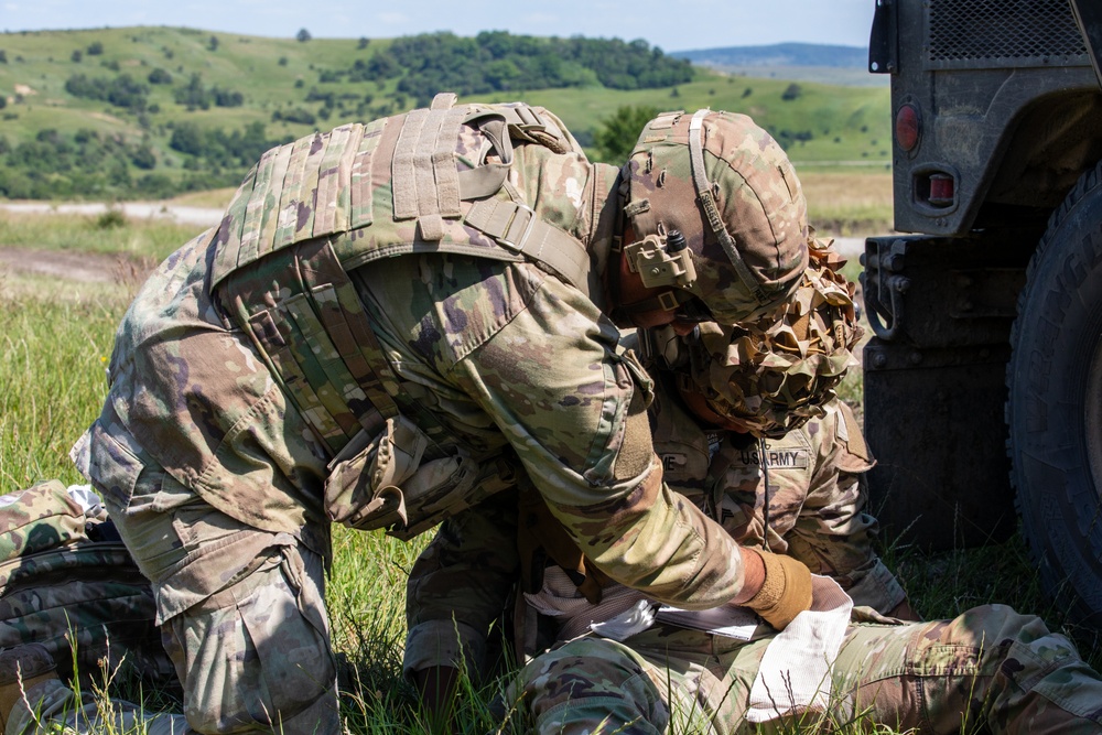 41st FAB Soldiers conduct medical operations during a simulated mass casualty attack during Saber Guardian 25