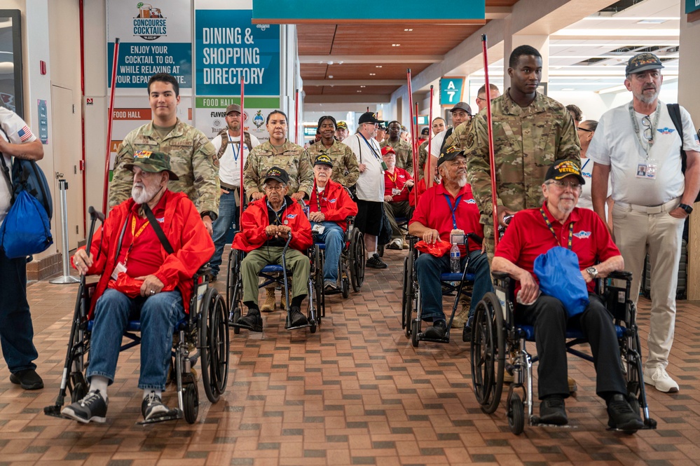 Members of Team Kirtland welcome home veterans of the Honor Flight