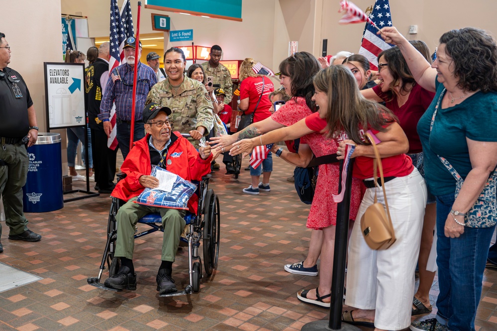 Members of Team Kirtland welcome home veterans of the Honor Flight