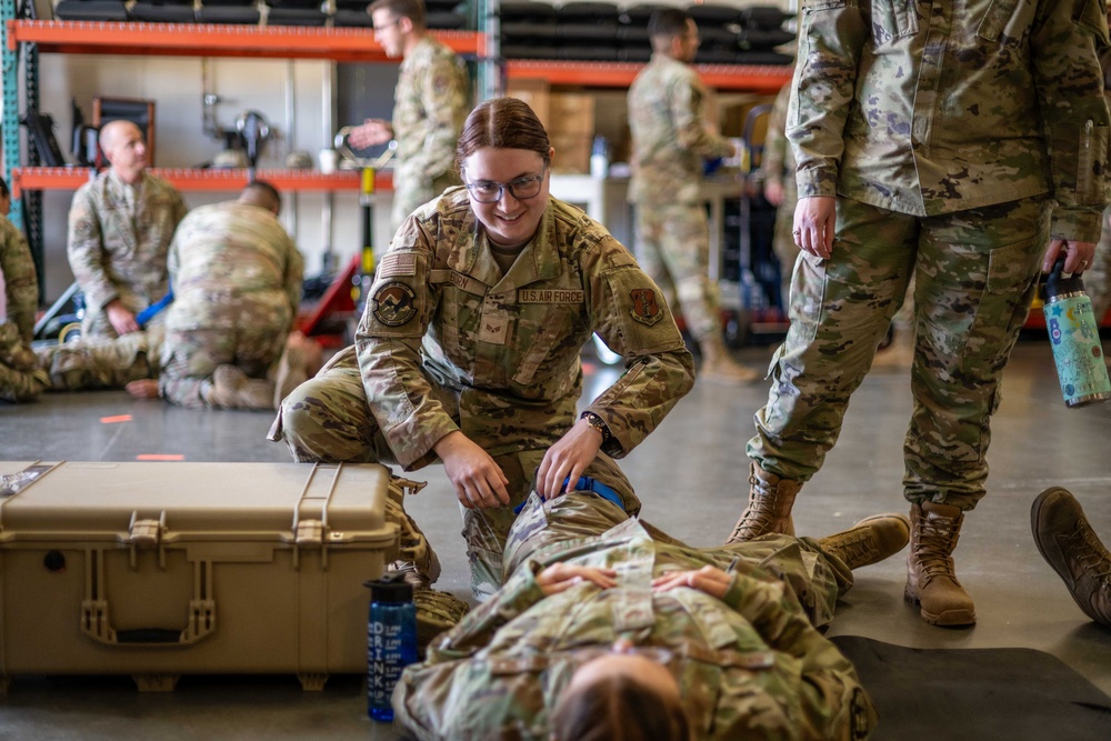 Airmen practicing live saving habits