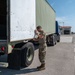 Airmen offload luggage at Aviano Air Base, Italy