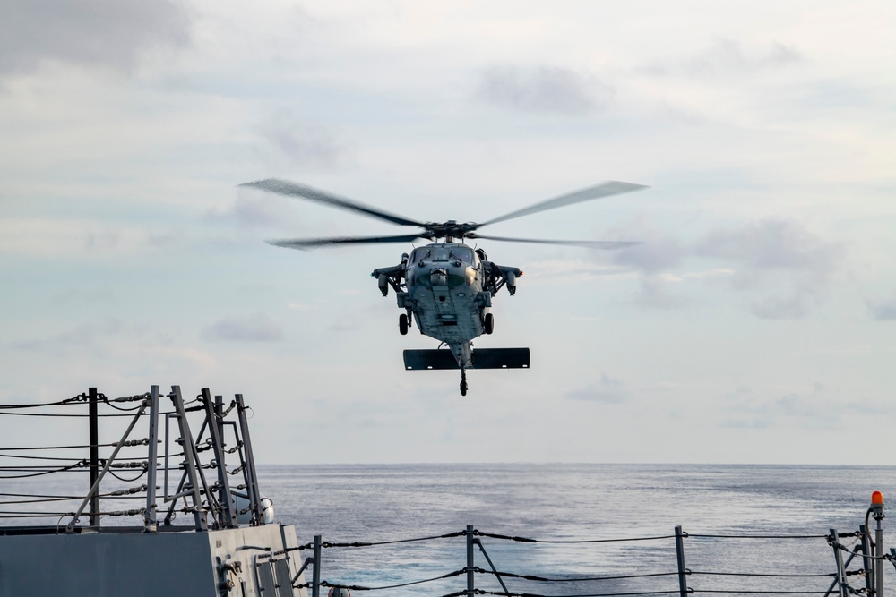 Helicopter lands on flight deck