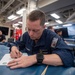 Sailor fills out form