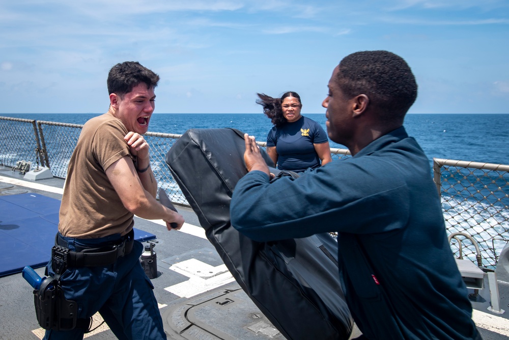 Sailors participate in OC spray course