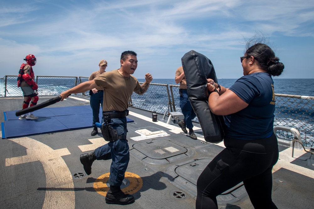 Sailors participate in OC spray course