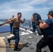 Sailors participate in OC spray course