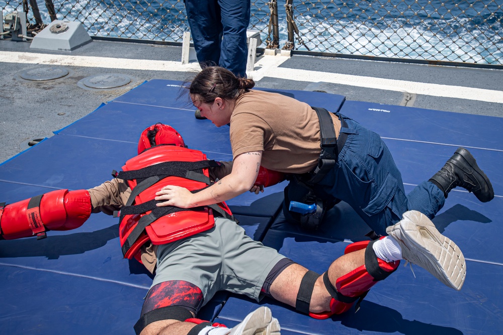 Sailors participate in OC spray course