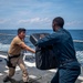 Sailors participate in OC spray course