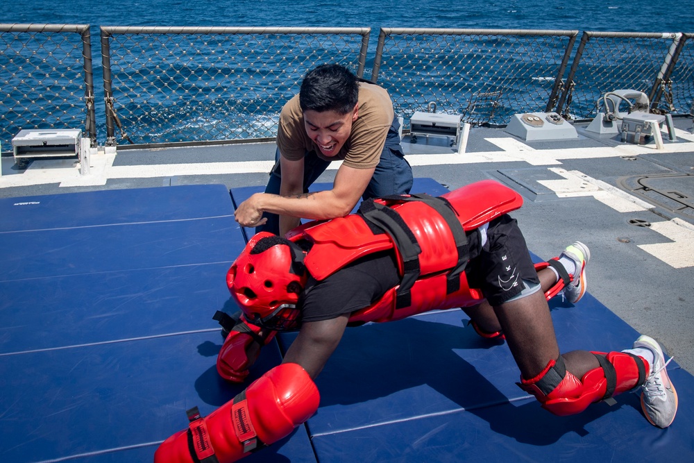 Sailors participate in OC spray course
