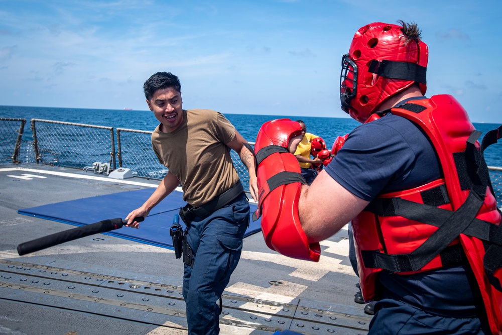 Sailors participate in OC spray course