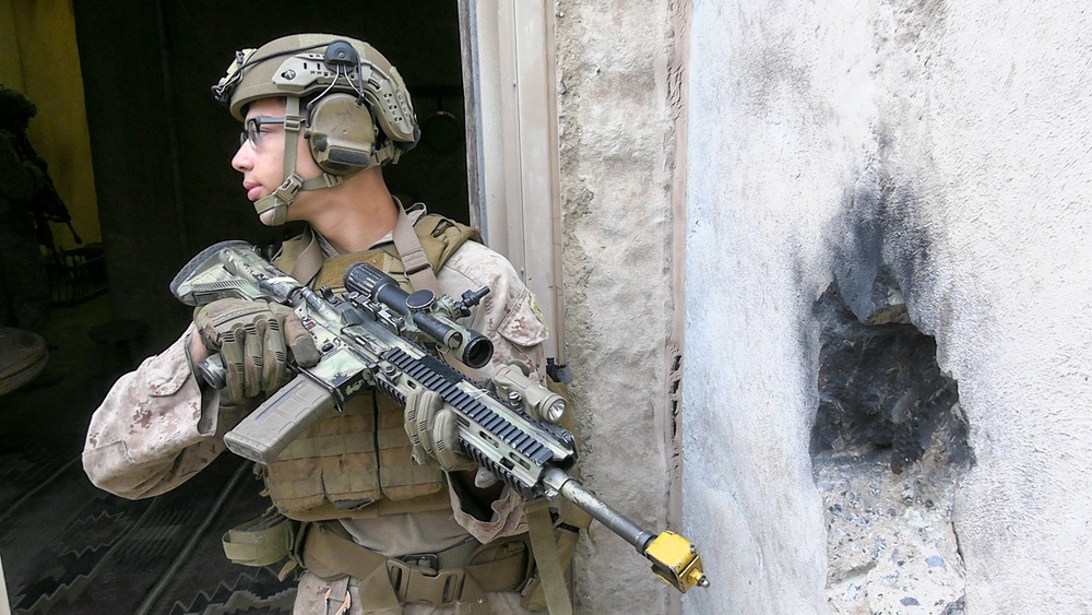U.S. Marines, Indonesian Korps Marinir perform training drills at the infantry immersion trainer