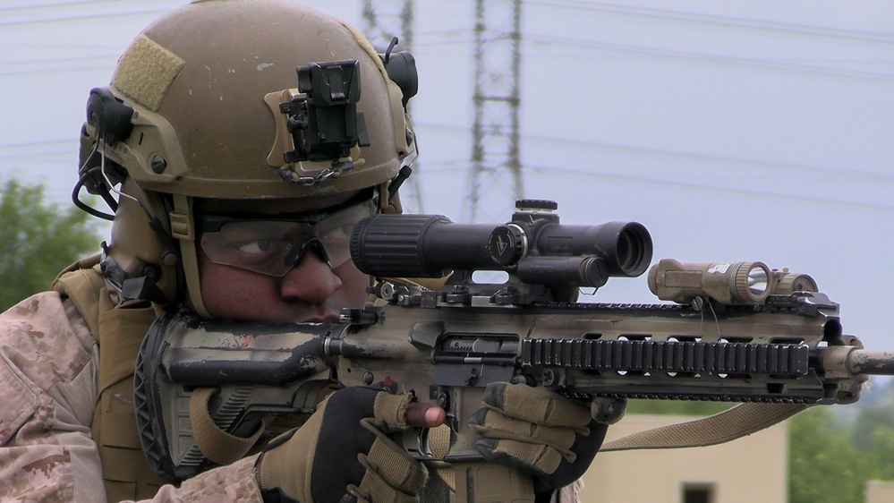 U.S. Marines, Indonesian Korps Marinir perform training drills at the infantry immersion trainer