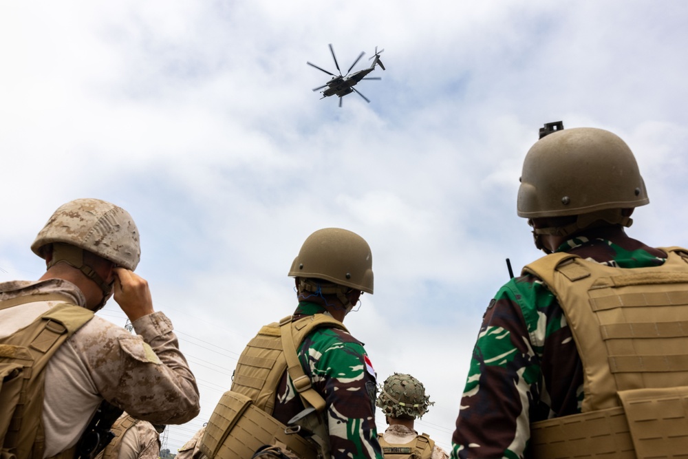 U.S. Marines and Indonesian Korps Marinir perform air raids at the infantry immersion trainer