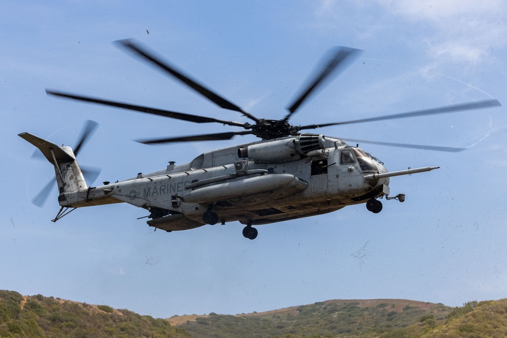 U.S. Marines and Indonesian Korps Marinir perform air raids at the infantry immersion trainer