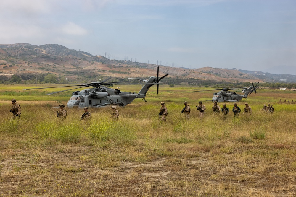 U.S. Marines and Indonesian Korps Marinir perform air raids at the infantry immersion trainer