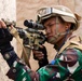 U.S. Marines and Indonesian Korps Marinir perform air raids at the infantry immersion trainer