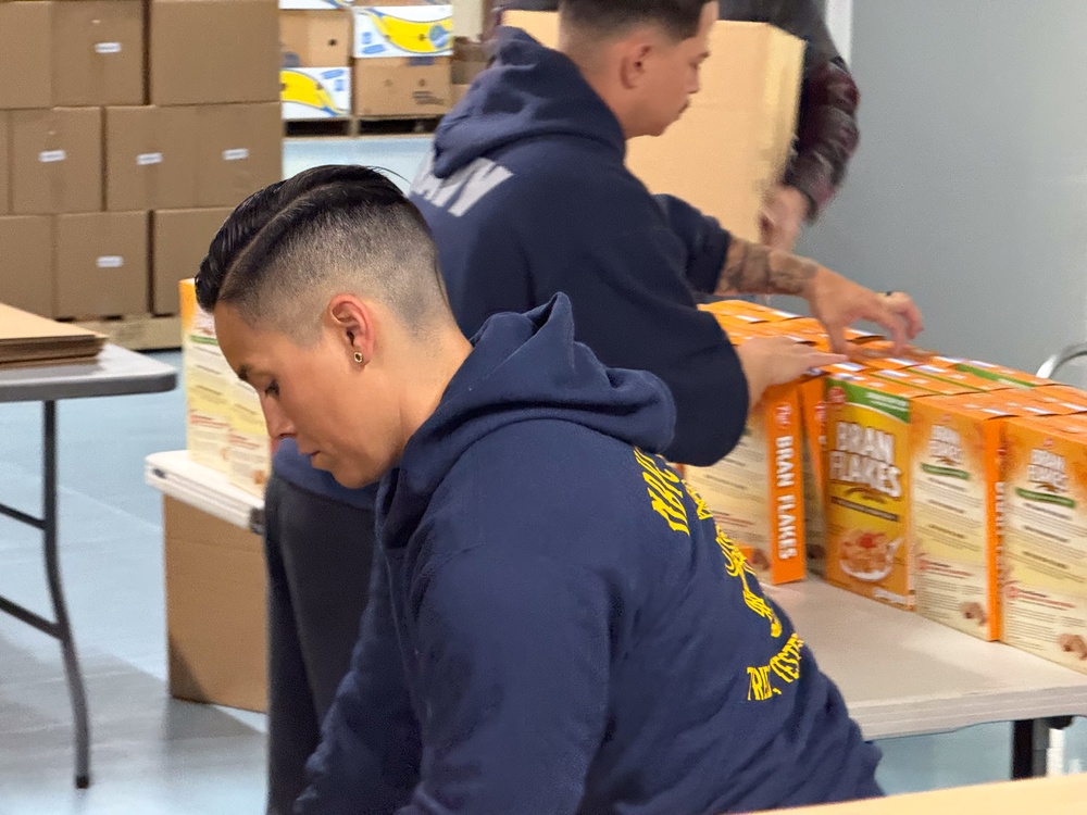 Sailors Join Forces with Alaskans to Fight Hunger During Navy Week