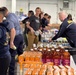 Sailors Join Forces with Alaskans to Fight Hunger During Navy Week