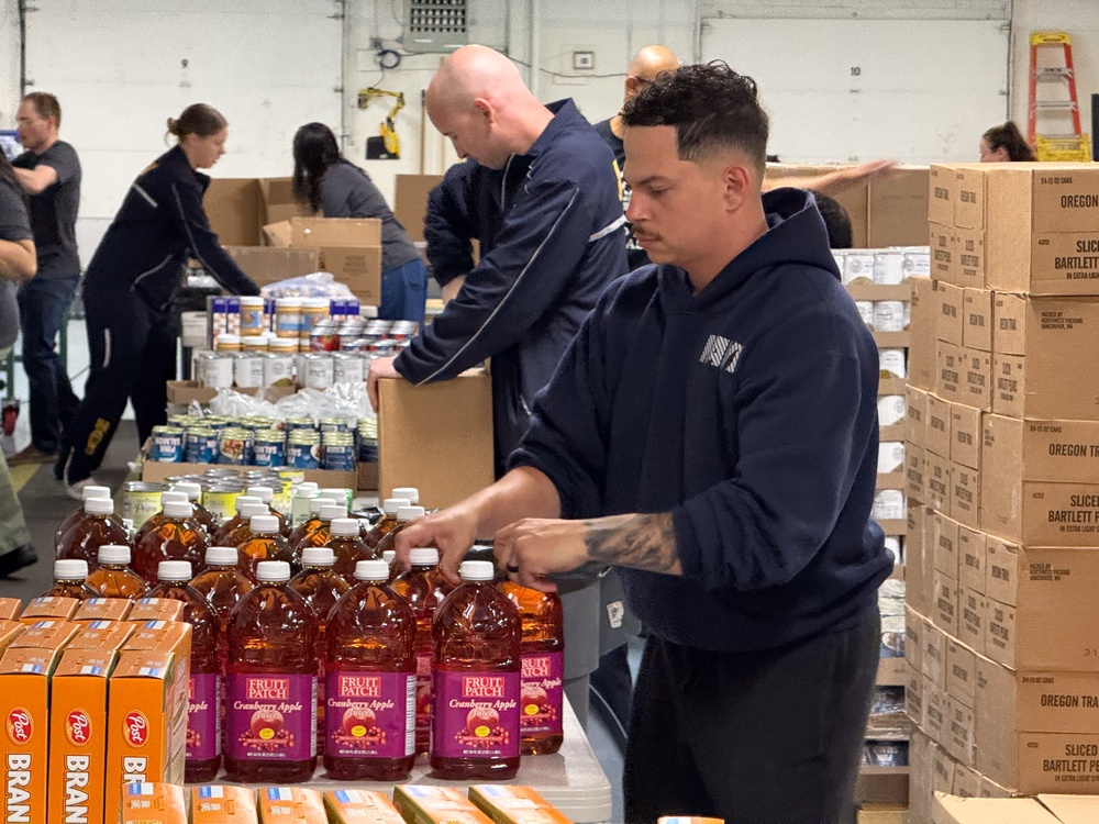 Sailors Join Forces with Alaskans to Fight Hunger During Navy Week
