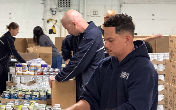 Sailors Join Forces with Alaskans to Fight Hunger During Navy Week