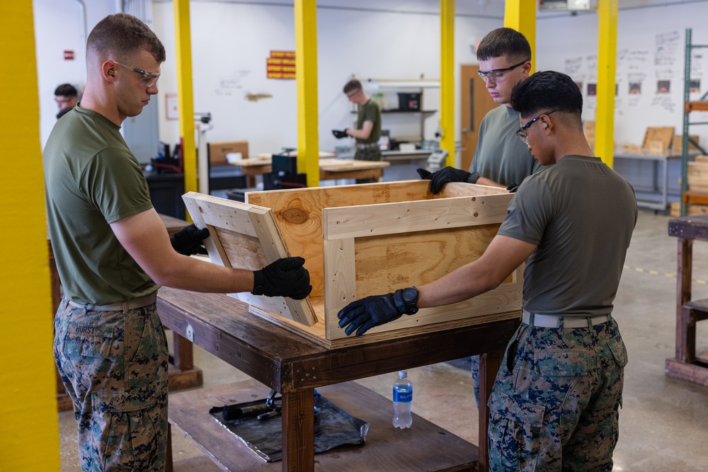 U.S. Marines with Distribution Management Instruction Company practice methods of preservation