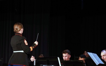 Gunnery Sergeant Lindsay S. Waller conducts combined band