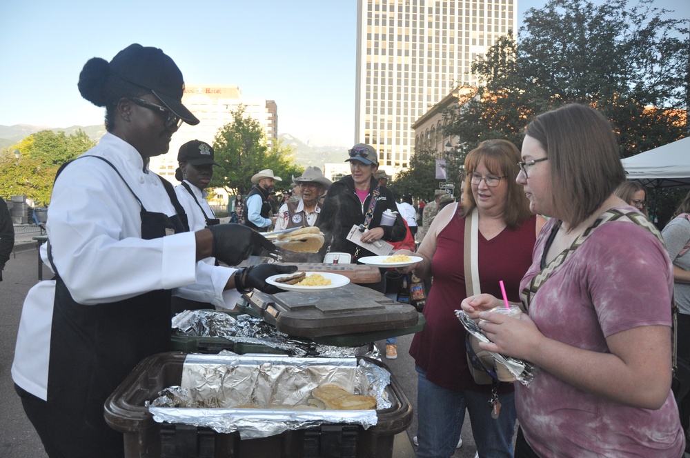 Soldiers volunteer during Western Heritage Street Breakfast