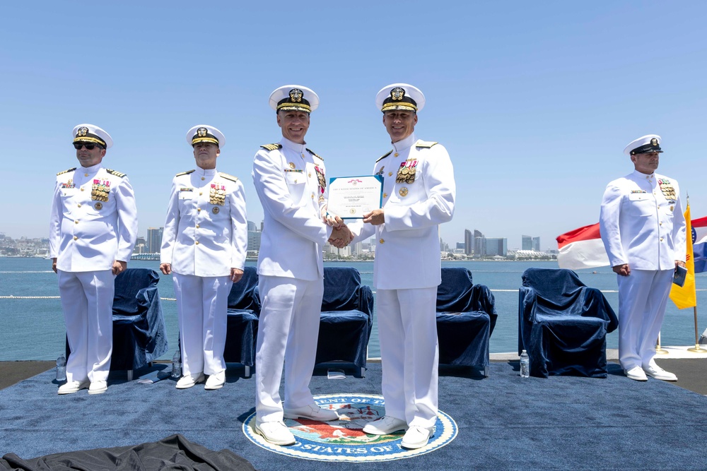 Abraham Lincoln conducts change of command ceremony