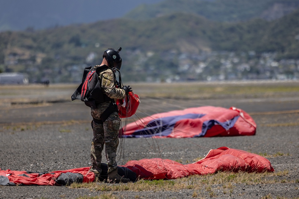 U.S. Army Soldiers Jump from an Osprey during a Recruitment Event in Hawaii