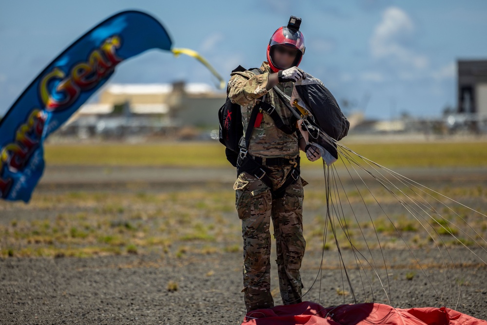 U.S. Army Soldiers Jump from an Osprey during a Recruitment Event in Hawaii