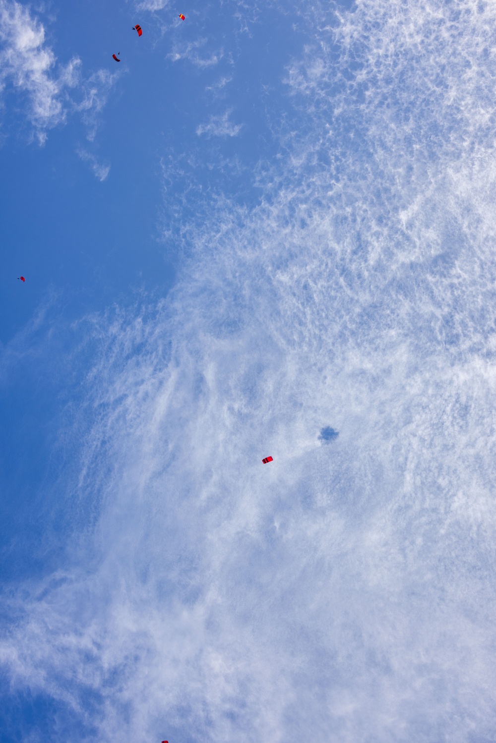 U.S. Army Soldiers Jump from an Osprey during a Recruitment Event in Hawaii