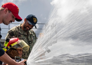 Guam Homeschool Association tours USS Emory S. Land