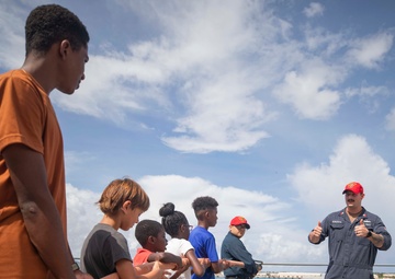 Guam Homeschool Association tours USS Emory S. Land