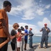 Guam Homeschool Association tours USS Emory S. Land