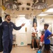 Guam Homeschool Association tours USS Emory S. Land